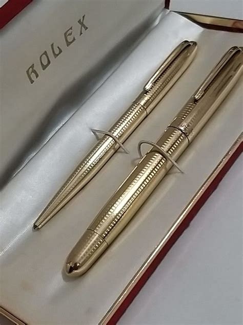 gold rolex pen